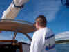 Heidi at the helm as we motor through Muscle Ridge Channel